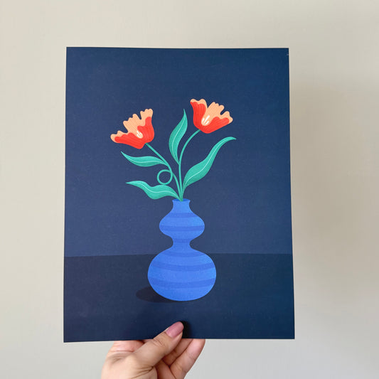 a vibrant art print with a deep blue background and a vibrant blue vase with dreamy red poppies