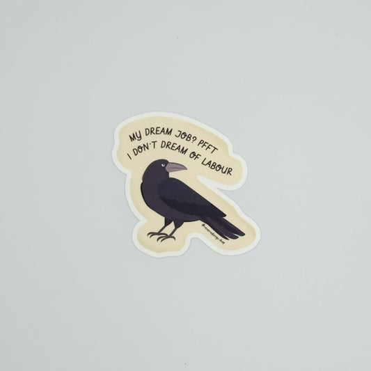 Matte sticker featuring smug angry crow and anti-work sentiment with text ‘My dream job? Pfft. I don’t dream of labor’