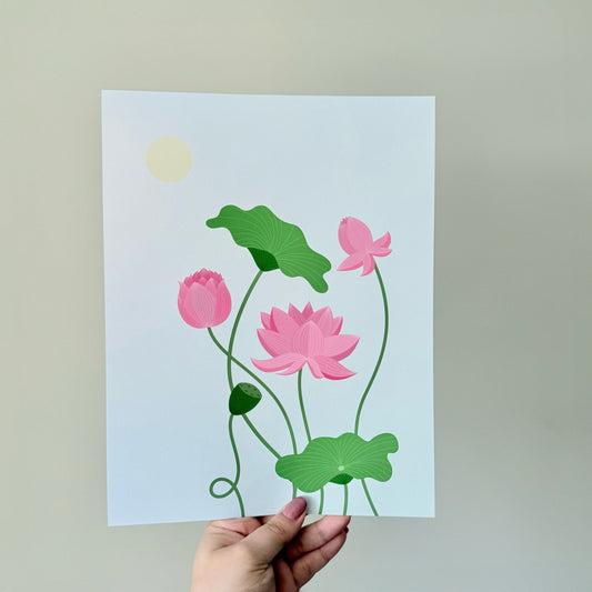 Lotus Daydream - A soft and luminous floral art print, featuring a peaceful lotus floating gently on a pastel blue background