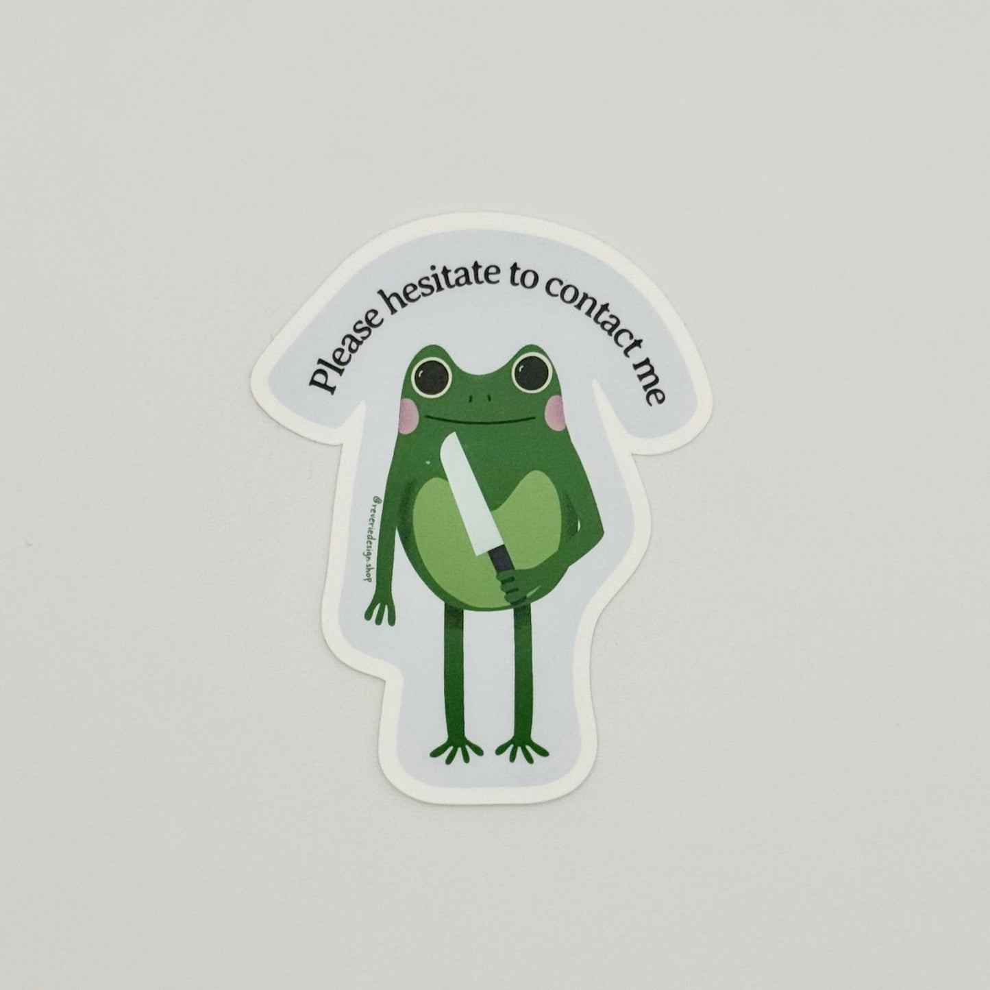 workplace rebellion introvert sticker for laptops with sarcastic frog illustration and text "Please Hesitate to Contact Me"