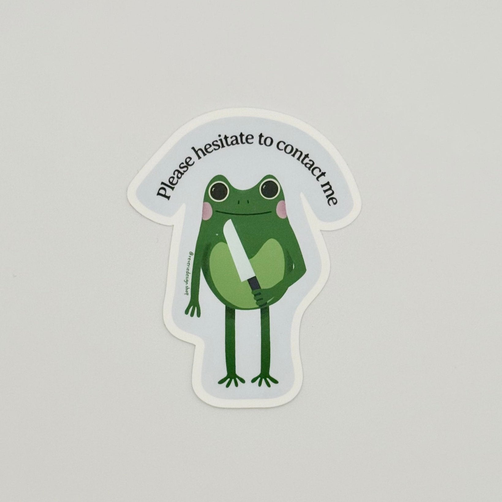 workplace rebellion introvert sticker for laptops with sarcastic frog illustration and text "Please Hesitate to Contact Me"