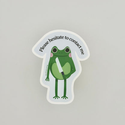 Anti-social office humor sticker with sarcastic frog illustration and text "Please Hesitate to Contact Me"