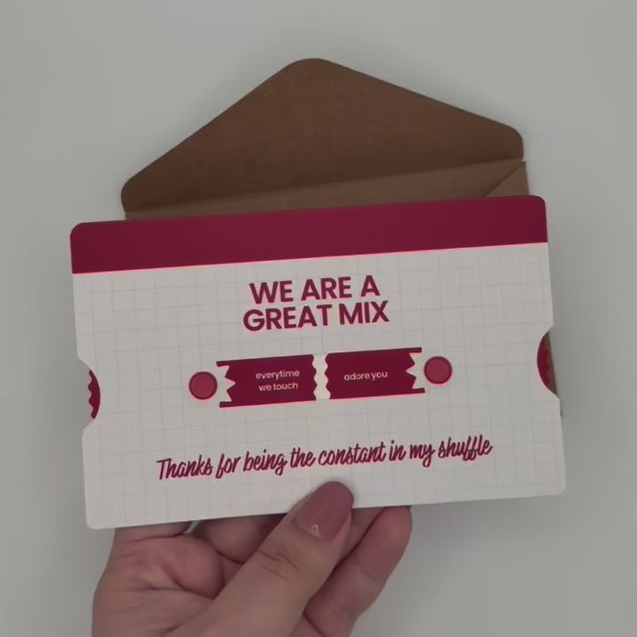 Showcasing interactive spinning or rotating greeting card revealing romantic playlist song titles. For anniversary or valentines day